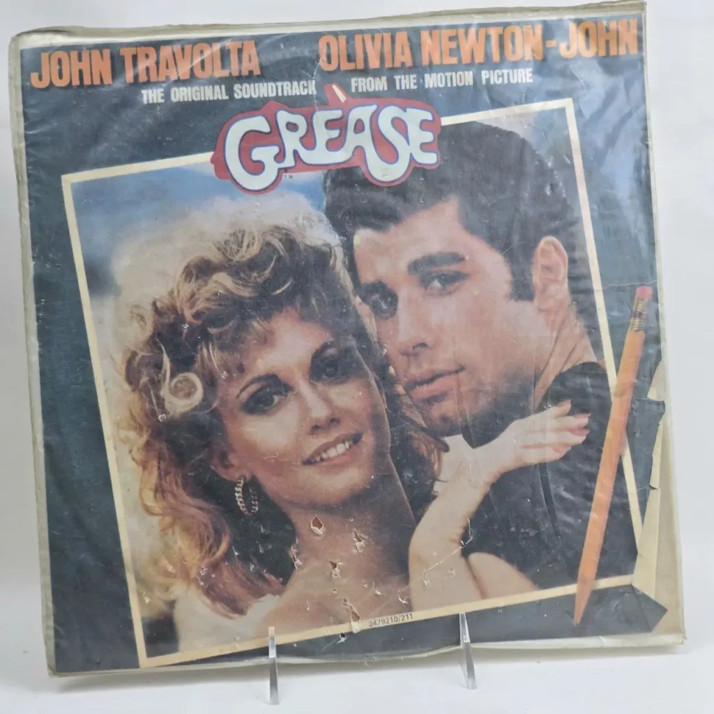 Portada del álbum de la banda sonora original de Grease con John Travolta y Olivia Newton-John. by Remates Narvaja