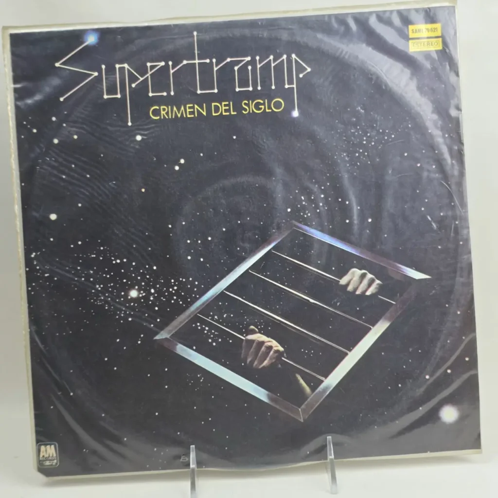 Portada de vinilo Supertramp Crimen del Siglo con manos tras rejas en el espacio. by Remates Narvaja