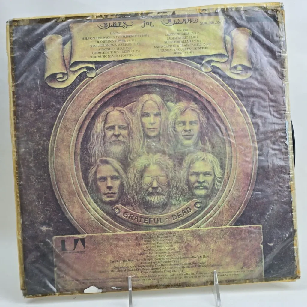 Portada de disco de vinilo Grateful Dead - Blues for Allah, con caras de los miembros de la banda. by Remates Narvaja