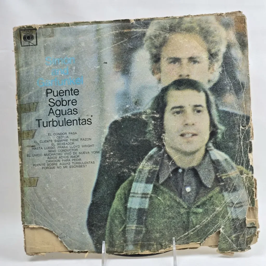 Portada de álbum de vinilo Simon & Garfunkel "Puente Sobre Aguas Turbulentas" desgastada. by Remates Narvaja