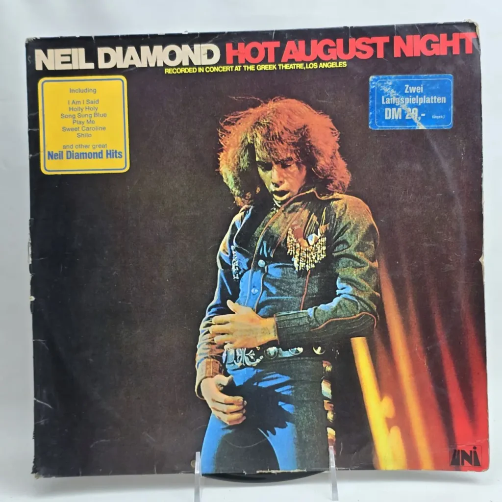 Portada del álbum de vinilo Neil Diamond Hot August Night, con Neil Diamond en el escenario." by Remates Narvaja