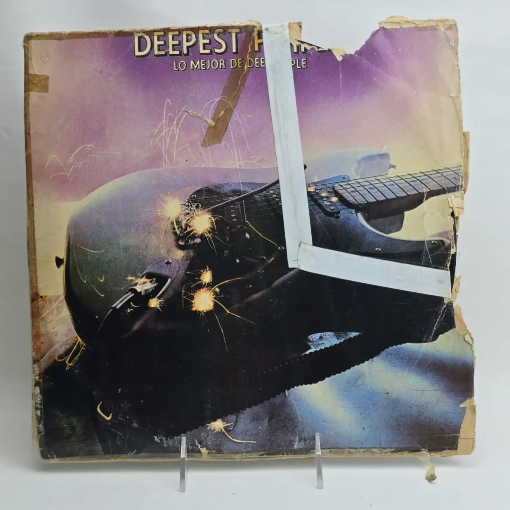 Álbum Deep Purple Deepest Hits Lo Mejor de, con guitarra eléctrica y chispas, cubierta dañada. by Remates Narvaja