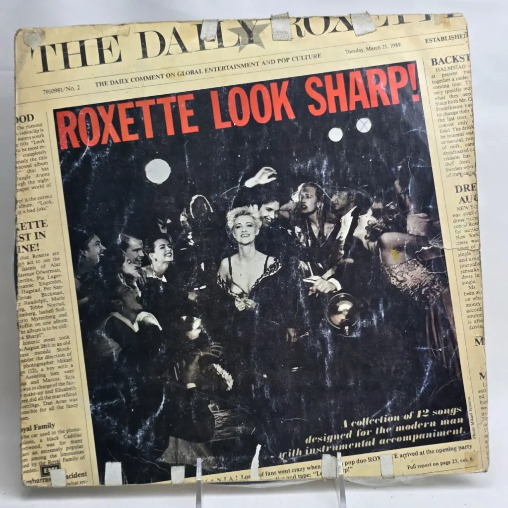 Portada del álbum "Look Sharp!" de Roxette de 1989, diseñada como un periódico llamado "The Daily Roxette", mostrando a by Remates Narvaja