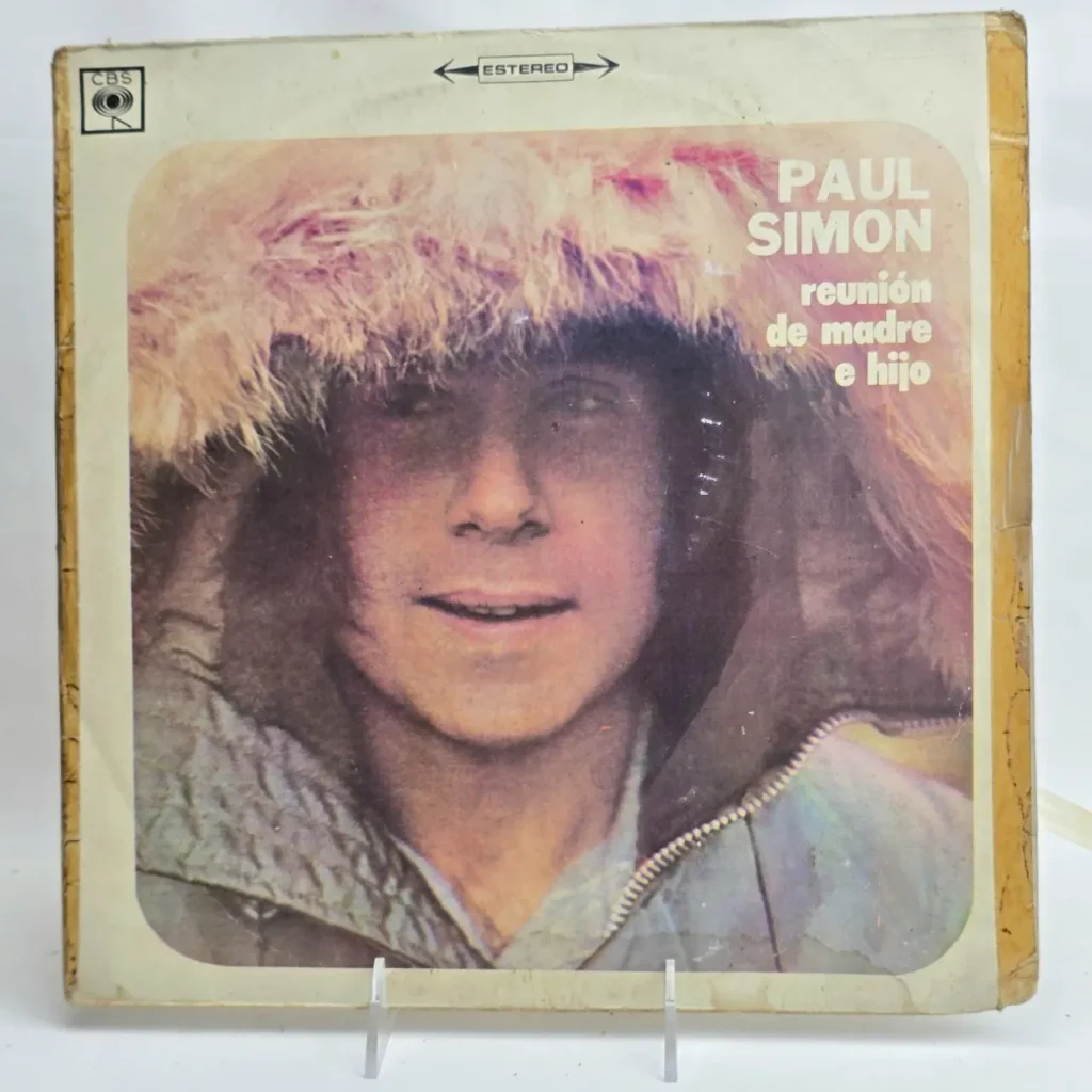 Álbum de vinilo Paul Simon - Reunión de madre e hijo, con Paul Simon en parka. by Remates Narvaja