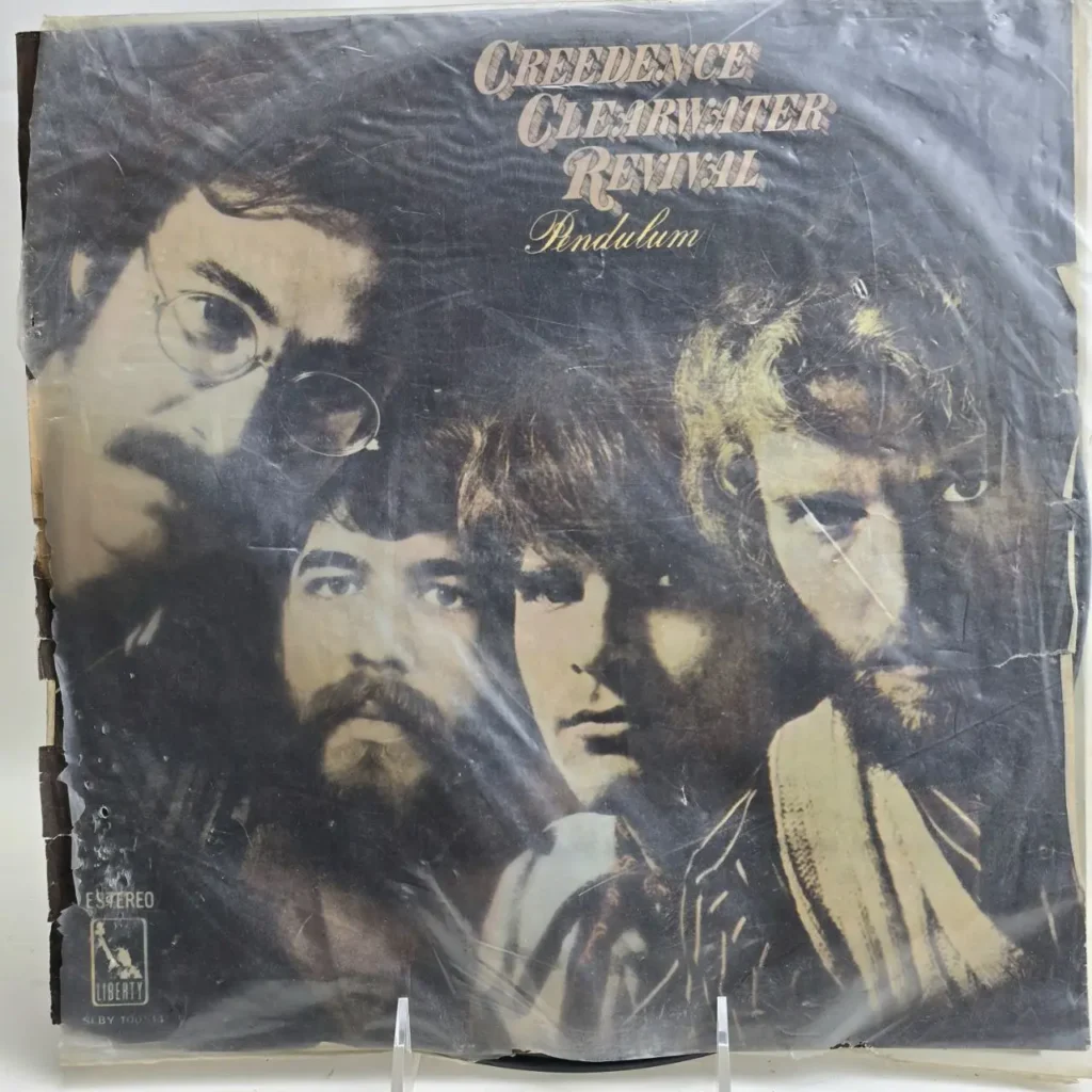 Portada del álbum de vinilo Pendulum de Creedence Clearwater Revival, mostrando a los cuatro miembros de la banda." by Remates Narvaja