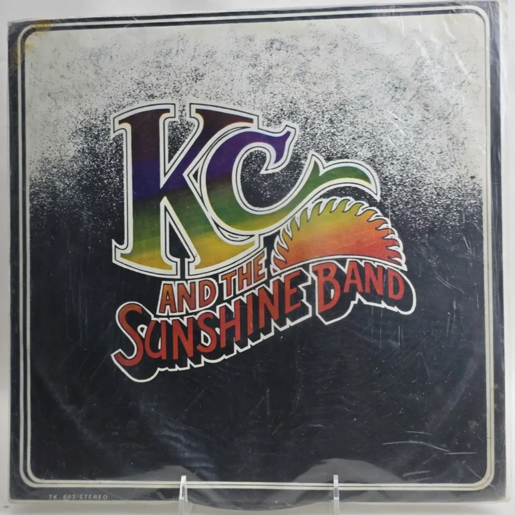 Portada de álbum de vinilo de KC and the Sunshine Band con logo arcoíris y número TK-603. by Remates Narvaja