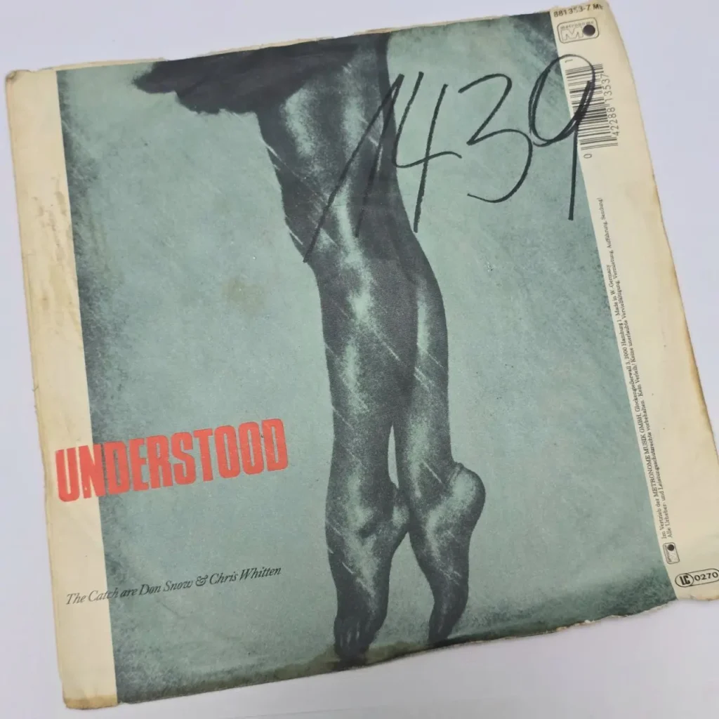 Portada de vinilo "Understood" de The Catch (Don Snow & Chris Whitten) con piernas de bailarina en punta. by Remates Narvaja