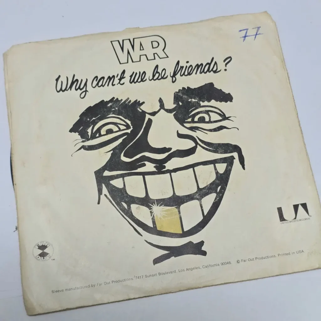 Portada del single de War "Why Can't We Be Friends?" con ilustración de cara sonriente. by Remates Narvaja