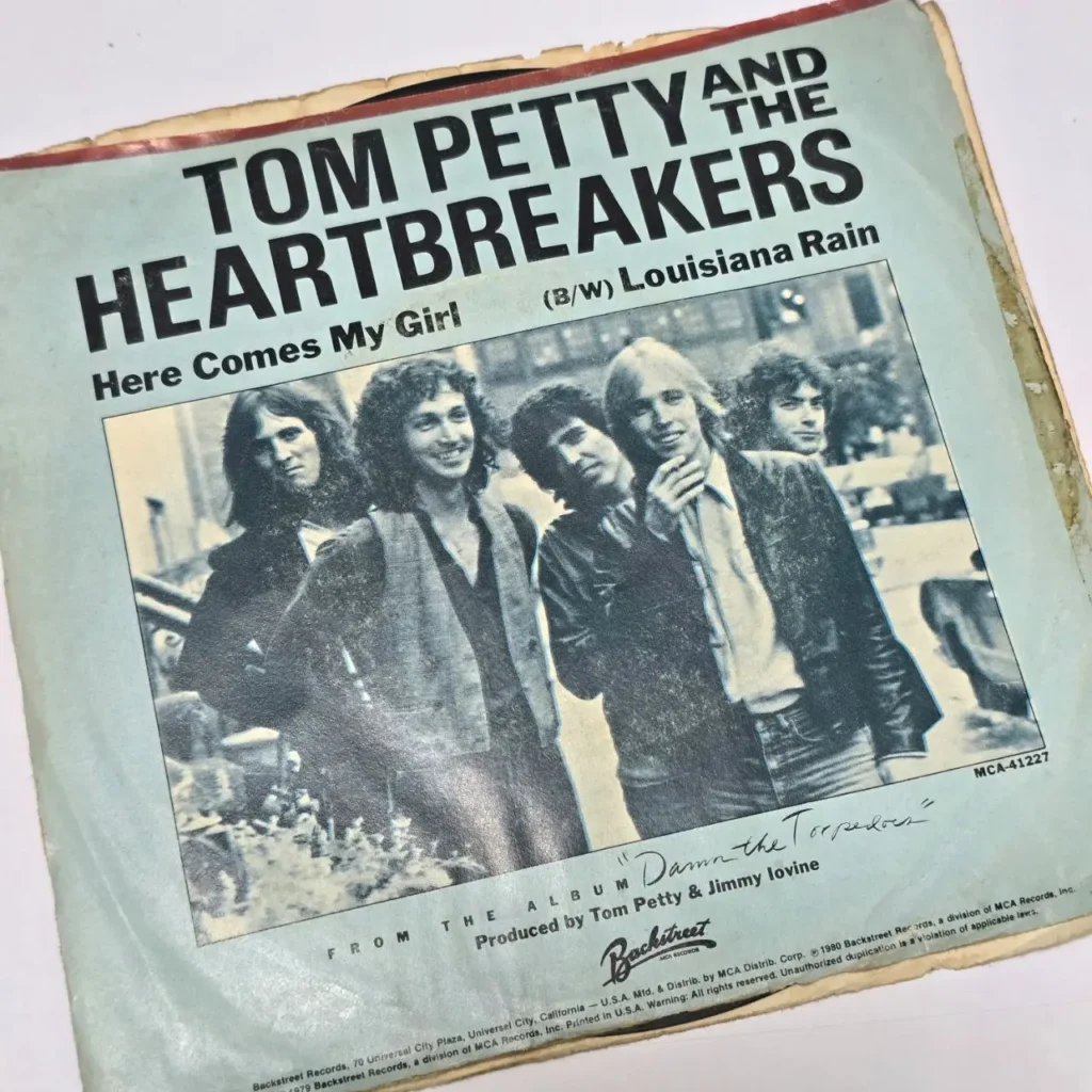 Tom Petty and The Heartbreakers 'Here Comes My Girl' 7-inch single record sleeve. by Remates Narvaja