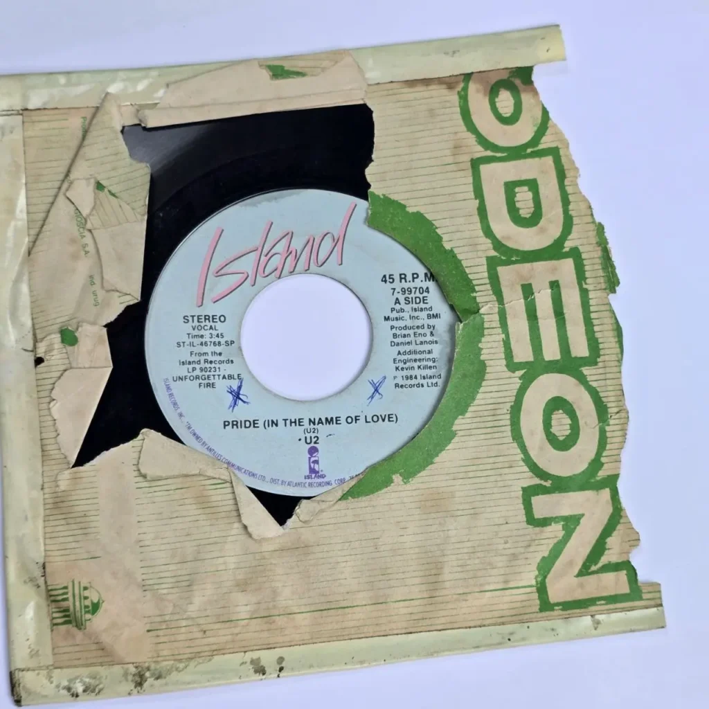 Disco de vinilo U2 "Pride (In the Name of Love)" 45 RPM de Island Records en funda Odeon rota. by Remates Narvaja