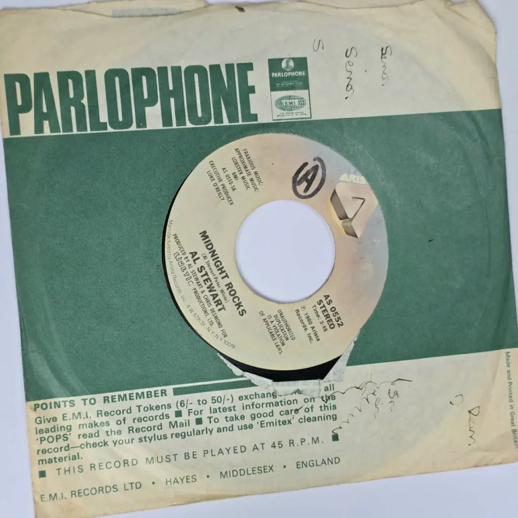 Vinilo 7 pulgadas Al Stewart Midnight Rocks en funda Parlophone. by Remates Narvaja