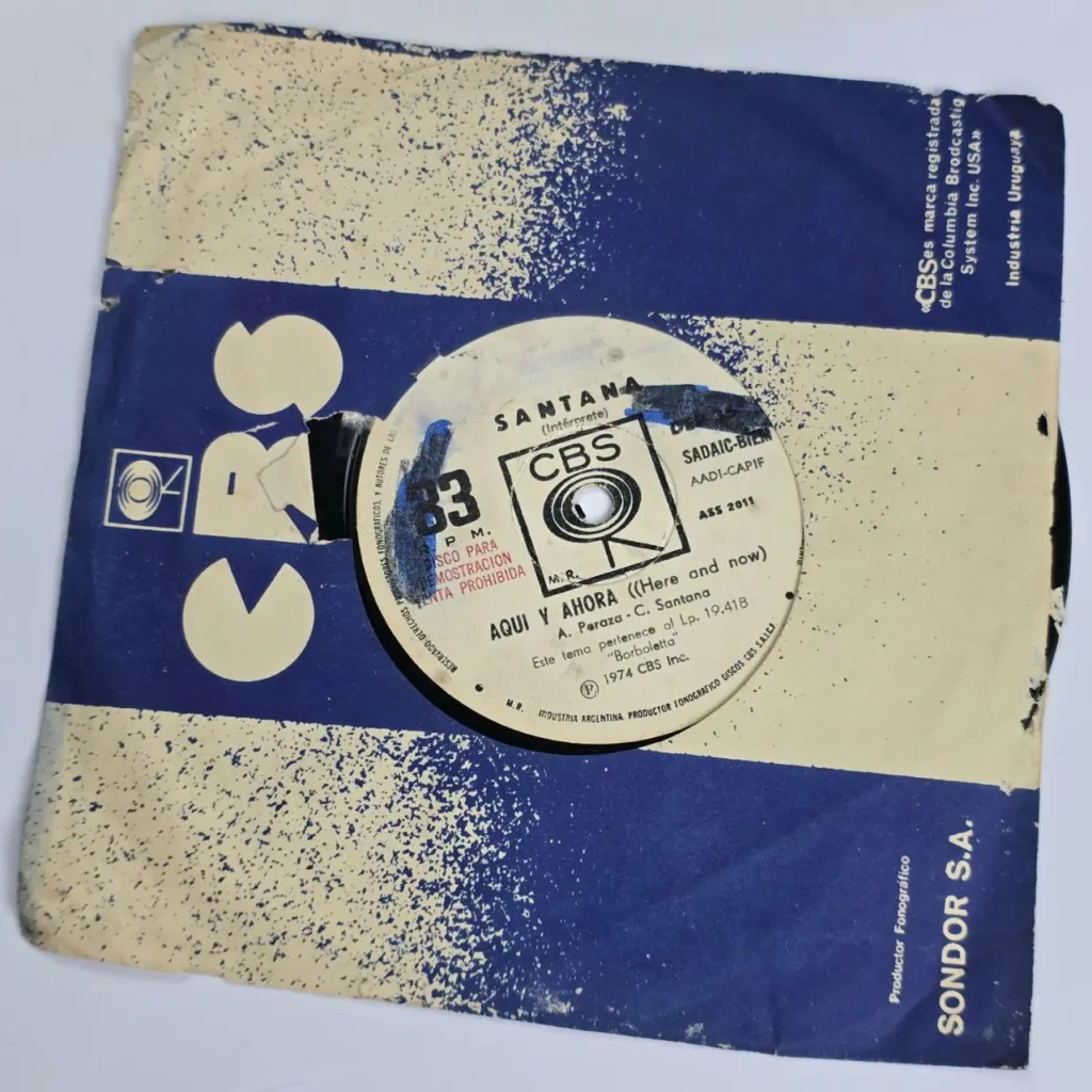 Disco de vinilo 7" promocional de Santana "Aquí y Ahora" (Here and Now) de 1974, sello CBS, by Remates Narvaja
