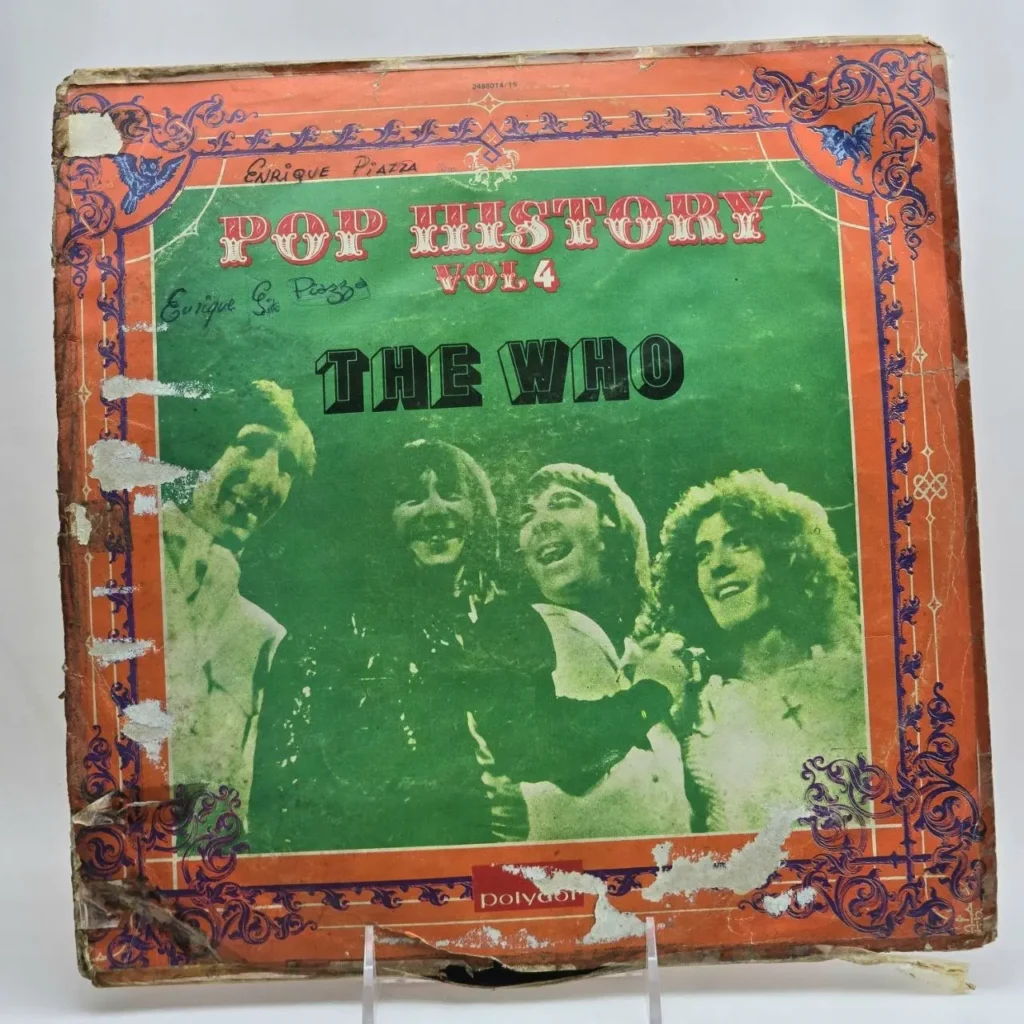 Portada de álbum de vinilo vintage The Who Pop History Vol 4, con la banda en fondo verde y bordes naranjas desgastados. by Remates Narvaja