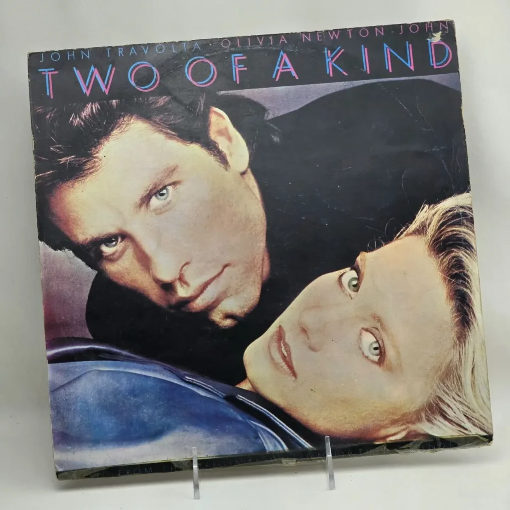 Portada de vinilo "Two of a Kind" con John Travolta y Olivia Newton-John. by Remates Narvaja