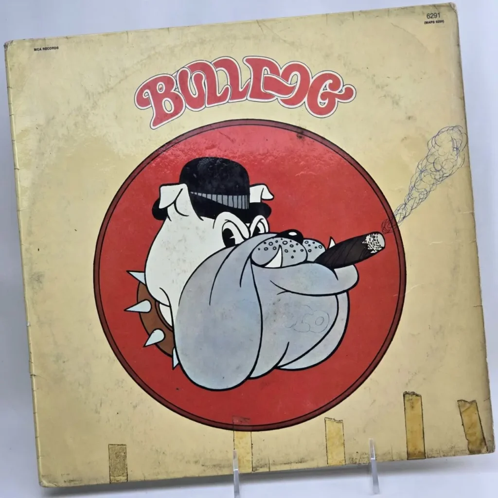 Cubierta de álbum Bulldog con bulldog de dibujos animados, sombrero y cigarro. by Remates Narvaja