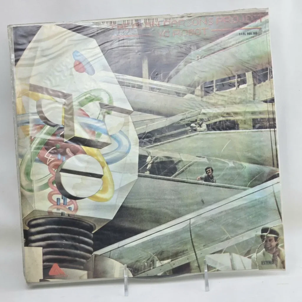 Portada del álbum de vinilo The Alan Parsons Project I Robot, con un robot abstracto y escaleras mecánicas. by Remates Narvaja