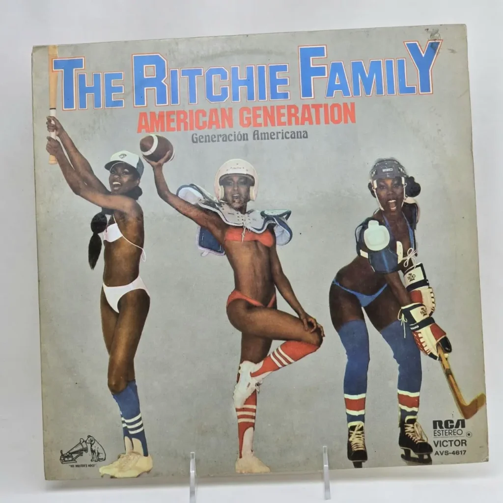 The Ritchie Family American Generation album cover with three women in baseball, football, and hockey outfits. by Remates Narvaja