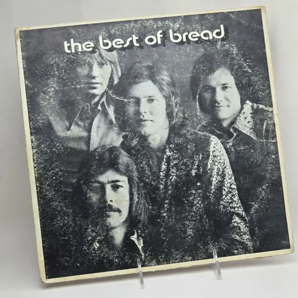 Portada del álbum de vinilo vintage 'The Best of Bread' de la banda Bread, en blanco y negro con los cuatro miembros del grupo. by Remates Narvaja