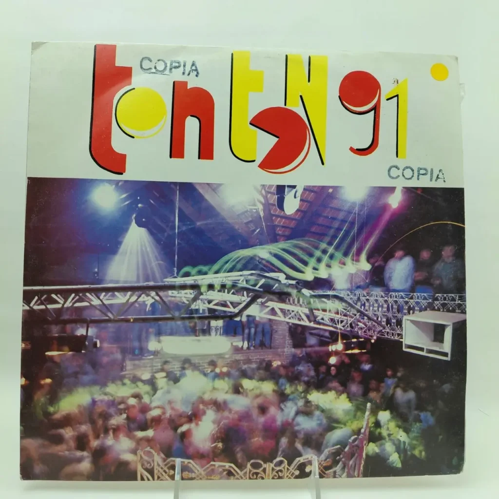 Portada de disco tonts 91 con escena de discoteca y gente bailando. by Remates Narvaja