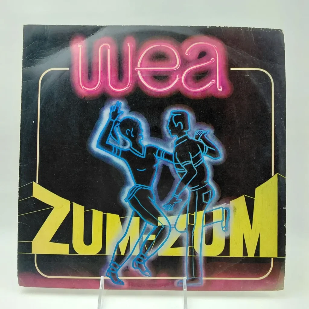 Portada de disco WEA Zum Zum con bailarines de neón. by Remates Narvaja