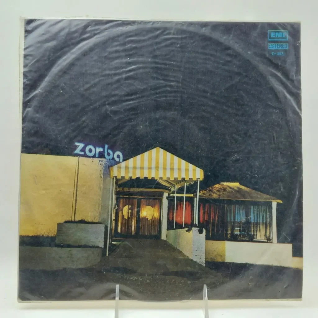 Portada de vinilo Zorba EMI Estereo Z-502 con club nocturno y letrero de neón. by Remates Narvaja