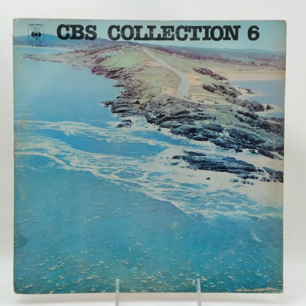 Álbum de vinilo CBS Collection 6 con portada de paisaje costero, océano y carretera. by Remates Narvaja
