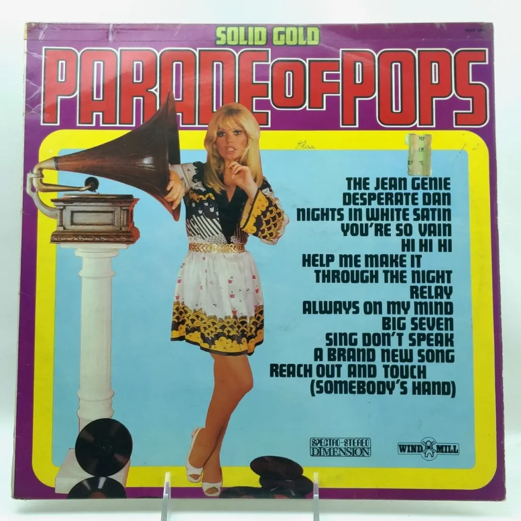 Cubierta de álbum "Solid Gold Parade of Pops" de los años 70 con una mujer rubia, un gramófono y una lista de by Remates Narvaja