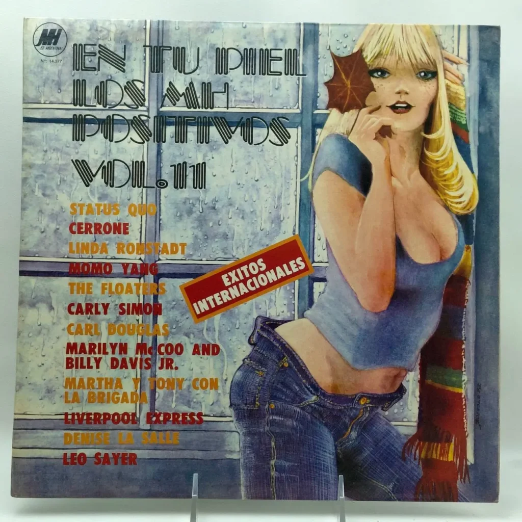 Portada de álbum vintage "Cien Mil Positivos Vol. III" con ilustración de mujer rubia en jeans y lista de éxitos internacionales. by Remates Narvaja