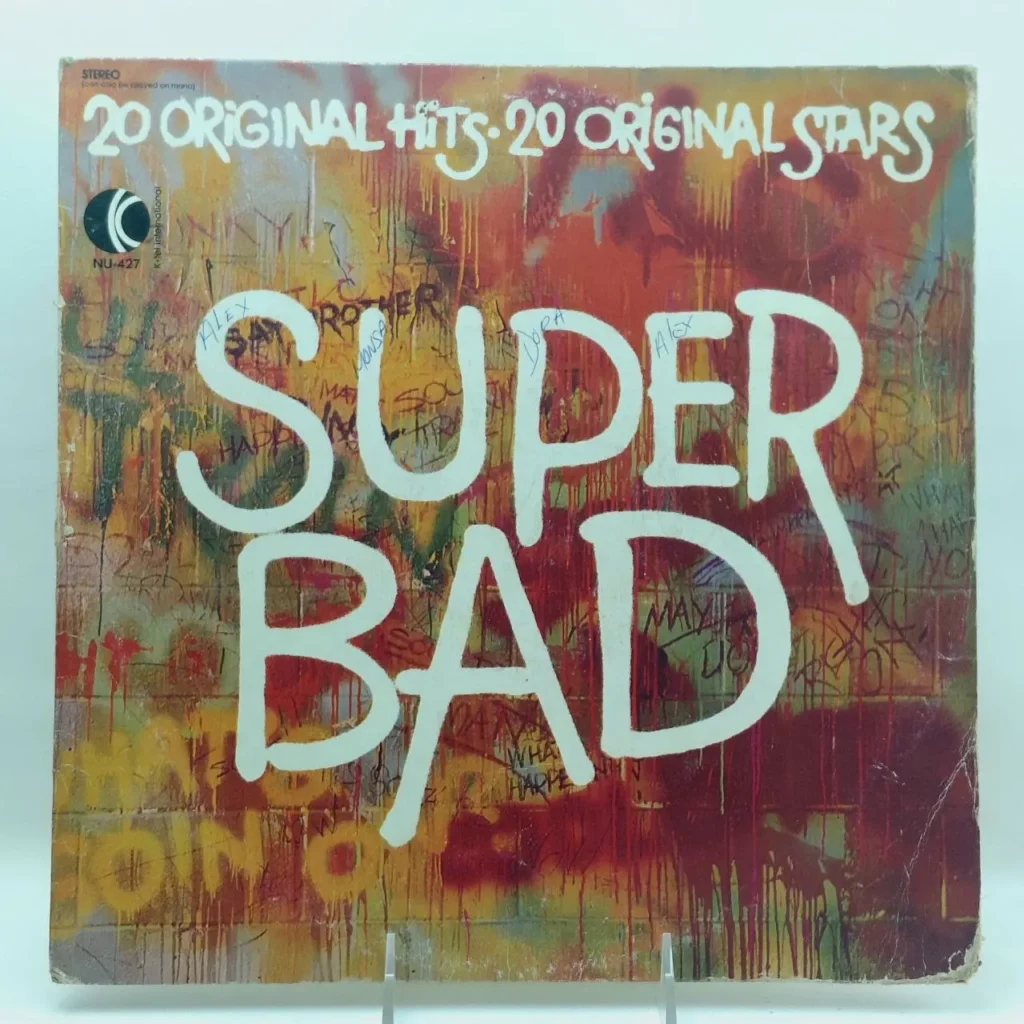 Portada de álbum de vinilo Super Bad con 20 Original Hits, 20 Original Stars y diseño estilo grafiti." by Remates Narvaja