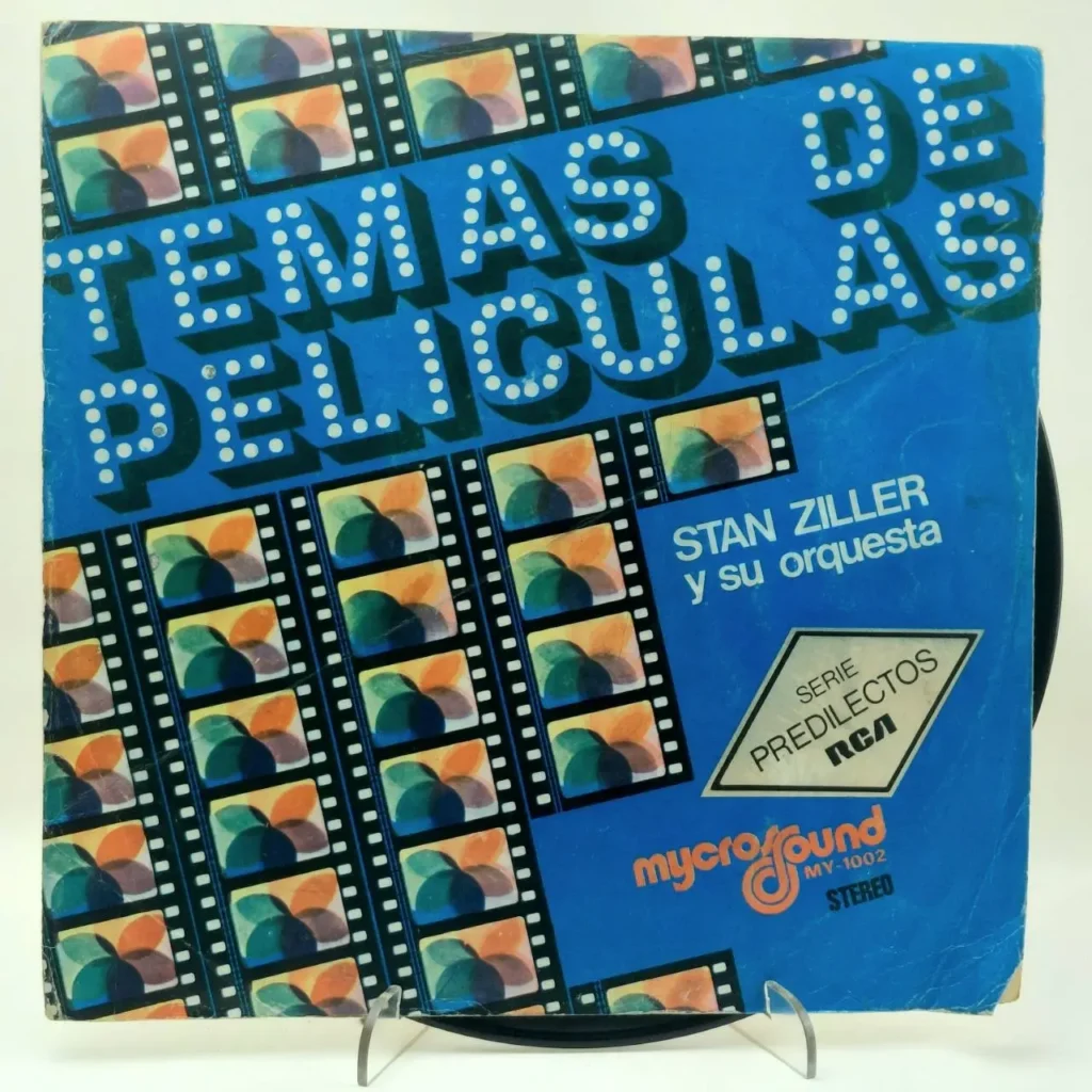 Carátula de vinilo azul "Temas de Películas" de Stan Ziller y su orquesta, con diseño de tiras de película. by Remates Narvaja