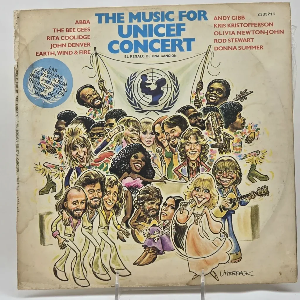 Portada de vinilo The Music for UNICEF Concert con caricaturas de ABBA, Bee Gees, John Denver y otros artistas. by Remates Narvaja
