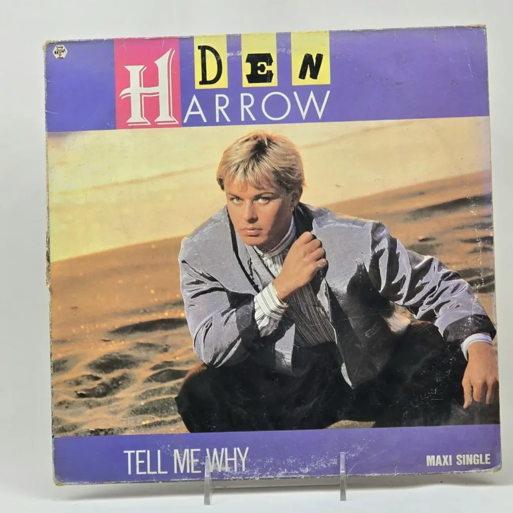 H. D. Arrow - Tell Me Why maxi single cover con el artista en traje gris. by Remates Narvaja
