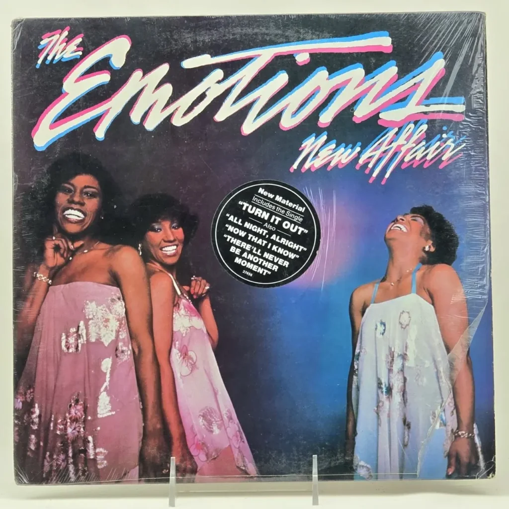 Portada del álbum de vinilo The Emotions New Affair, mostrando a las tres cantantes sonrientes. by Remates Narvaja