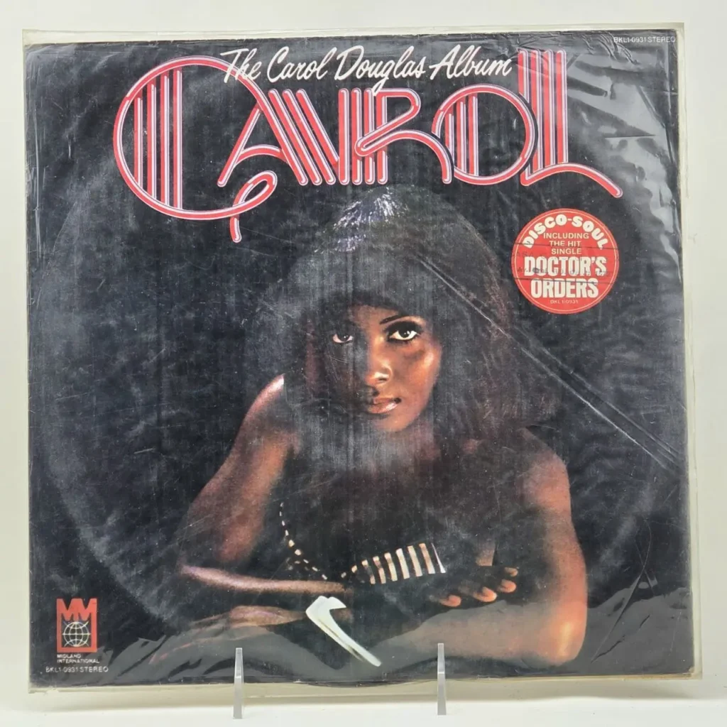 Portada del álbum de vinilo "The Carol Douglas Album" de Carol Douglas, con la cantante y la etiqueta "Disco-Soul" que incluye el sencillo " by Remates Narvaja