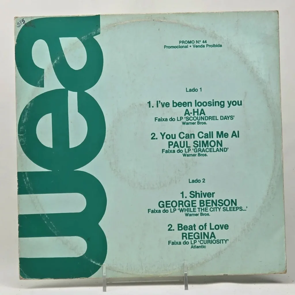 Funda promocional WEA Promo Nº 44 con lista de canciones de A-HA, Paul Simon, George Benson y Regina. by Remates Narvaja