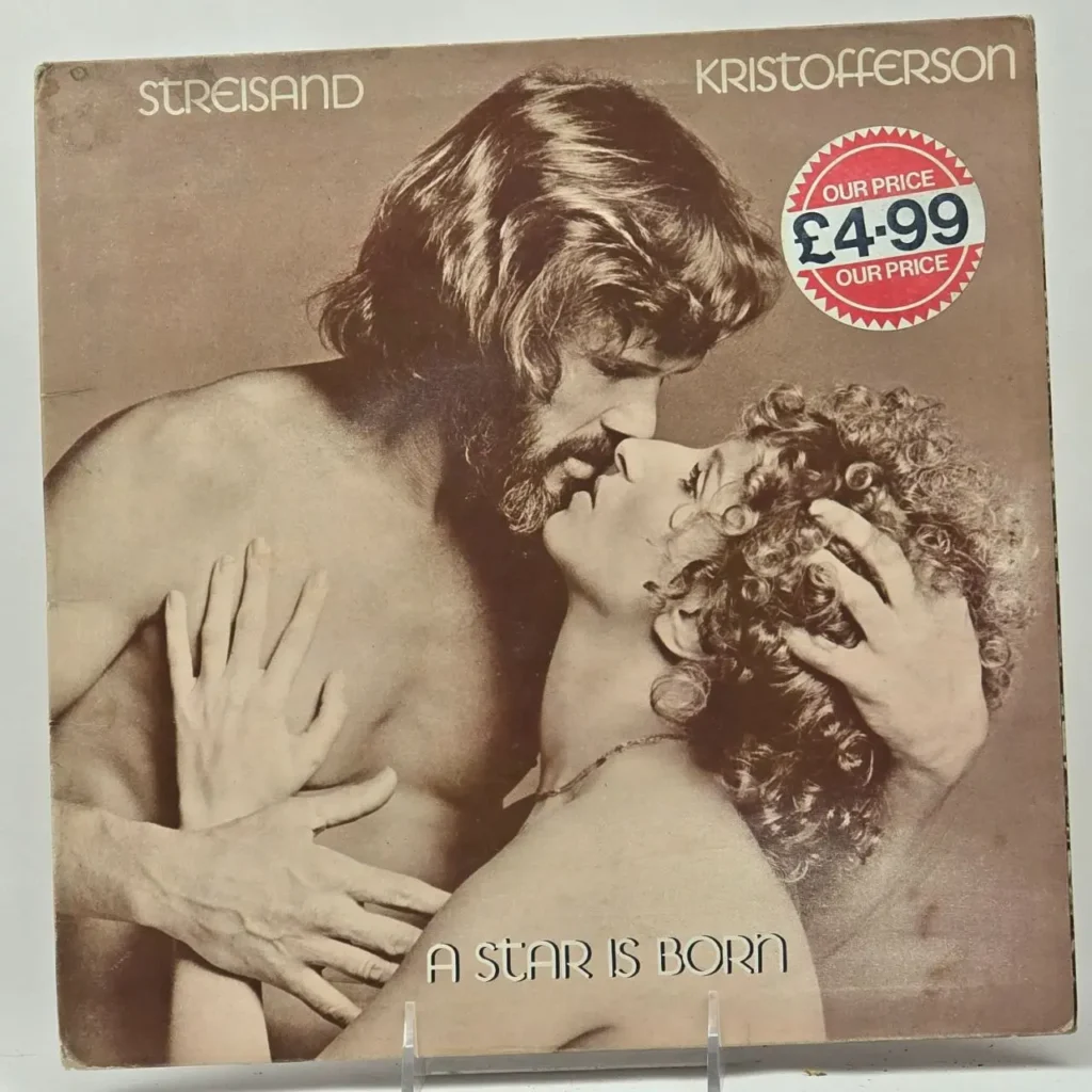 Portada de vinilo "A Star Is Born" de Barbra Streisand y Kris Kristofferson, en tono sepia, con un abrazo romántico by Remates Narvaja