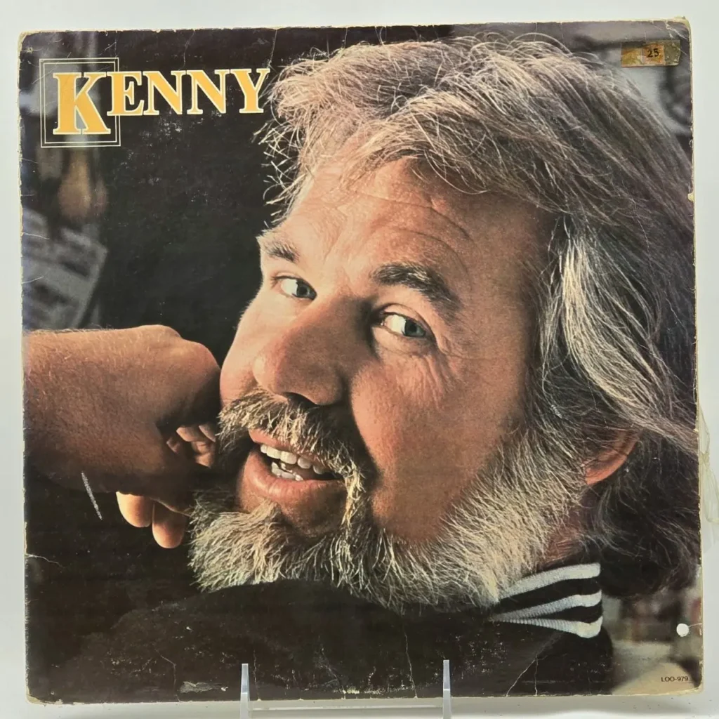 Portada del álbum "Kenny" de Kenny Rogers, mostrando su rostro sonriente y barba. by Remates Narvaja