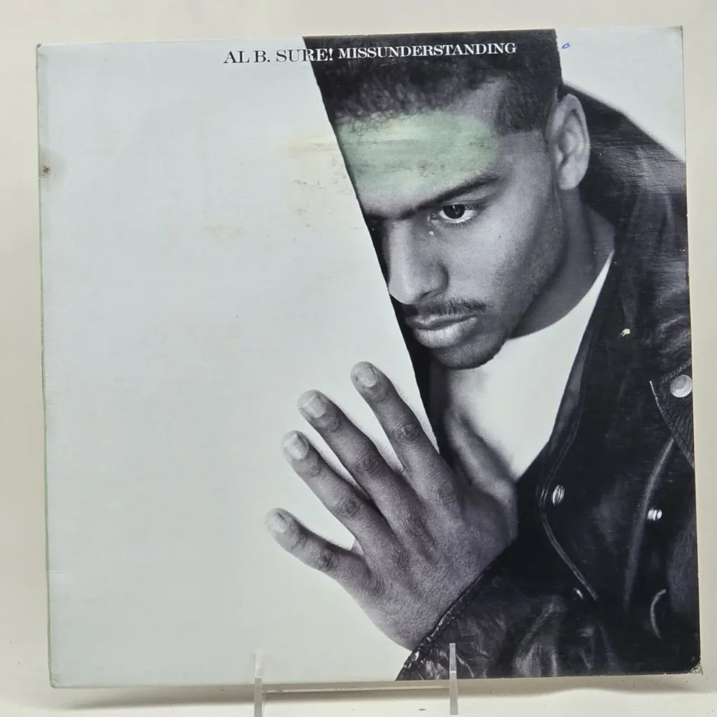 Cubierta del álbum de vinilo Al B. Sure! Misunderstanding, con el artista asomándose y su mano visible. by Remates Narvaja