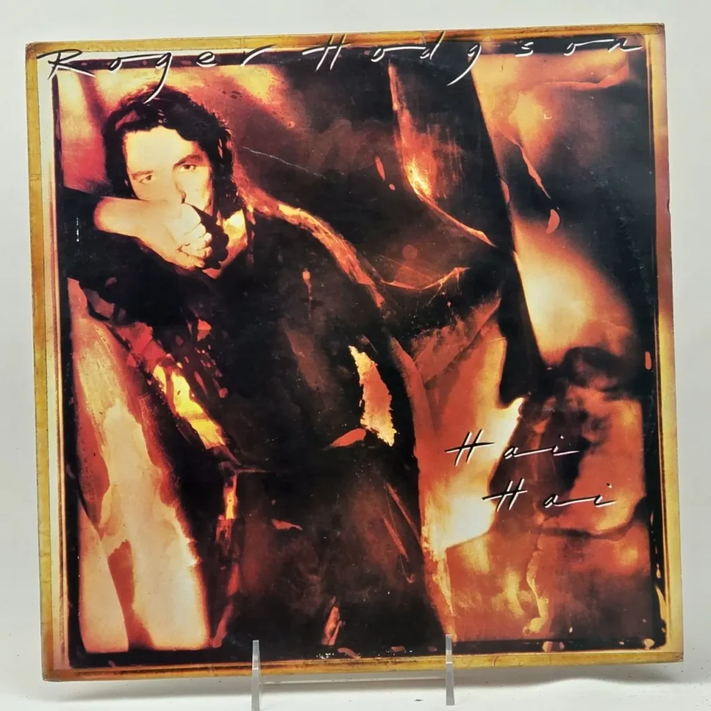 Portada del álbum "Hai Hai" de Roger Hodgson, con el artista en tonos cálidos. by Remates Narvaja