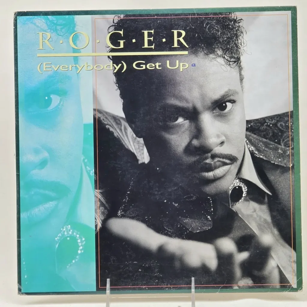 Portada del álbum de Roger (Everybody) Get Up, con el artista en blanco y negro y una imagen duplicada en azul. by Remates Narvaja