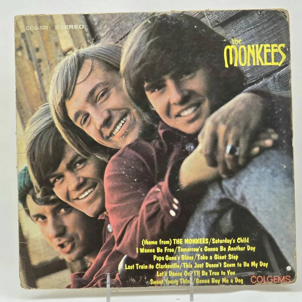 Portada del álbum The Monkees COS-101 STEREO con los cuatro miembros sonrientes. by Remates Narvaja