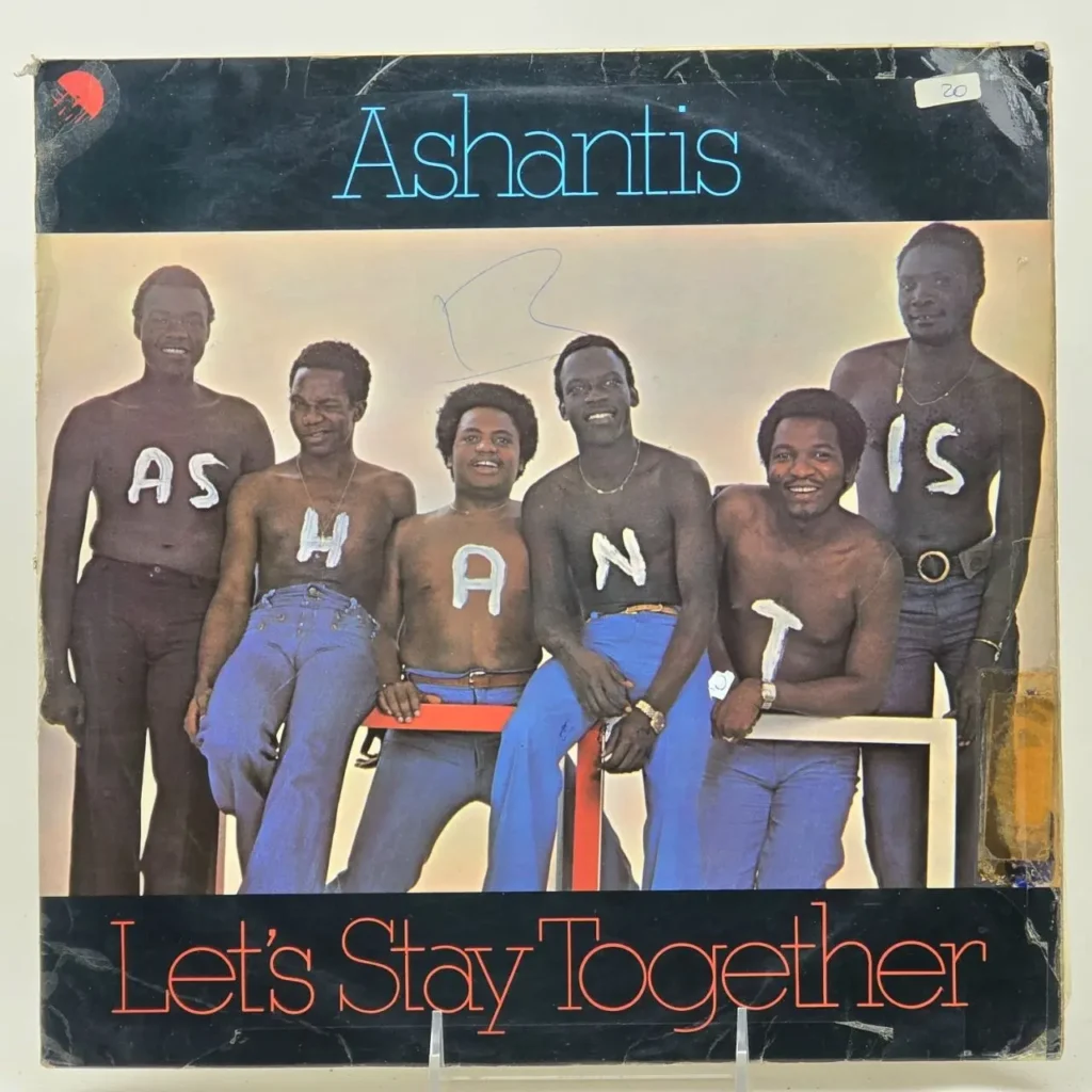 Portada del álbum "Let's Stay Together" de Ashantis, con seis hombres sin camisa y letras en el pecho formando el nombre de la banda. by Remates Narvaja