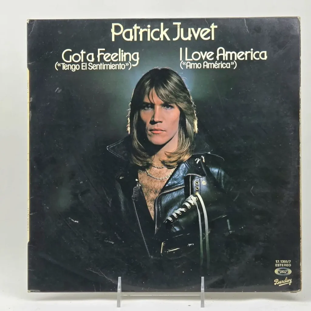 Portada de álbum de vinilo de Patrick Juvet "Got a Feeling" / "I Love America", con el artista en chaqueta de cuero y by Remates Narvaja
