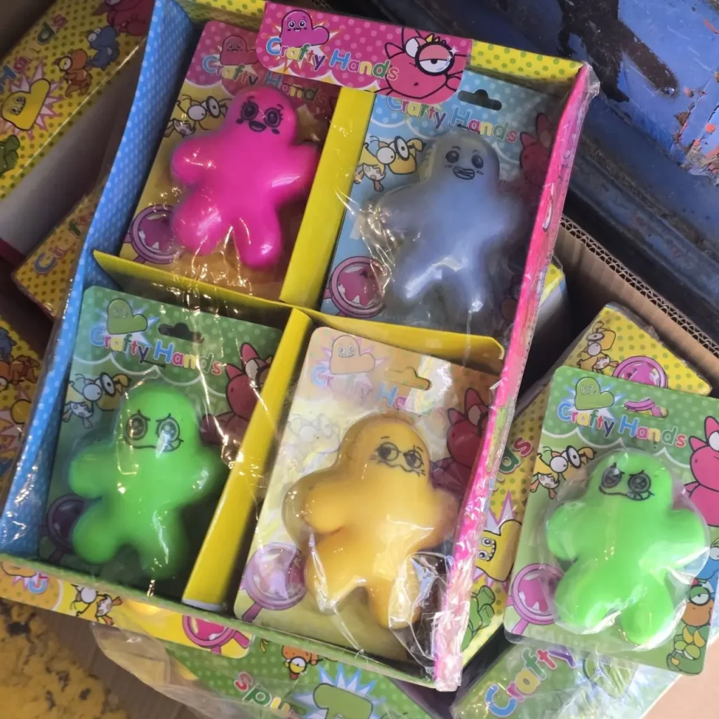 Caja de exhibición con juguetes pegajosos Crafty Hands de colores rosa, azul, verde y amarillo. by Remates Narvaja