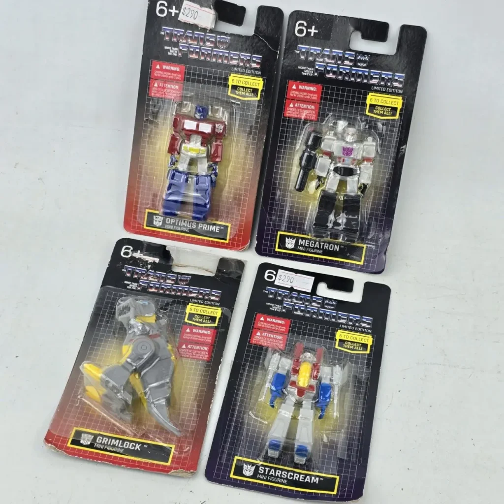 Colección de 4 mini figuras Transformers: Optimus Prime, Megatron, Grimlock, Starscream en empaque sellado. by Remates Narvaja