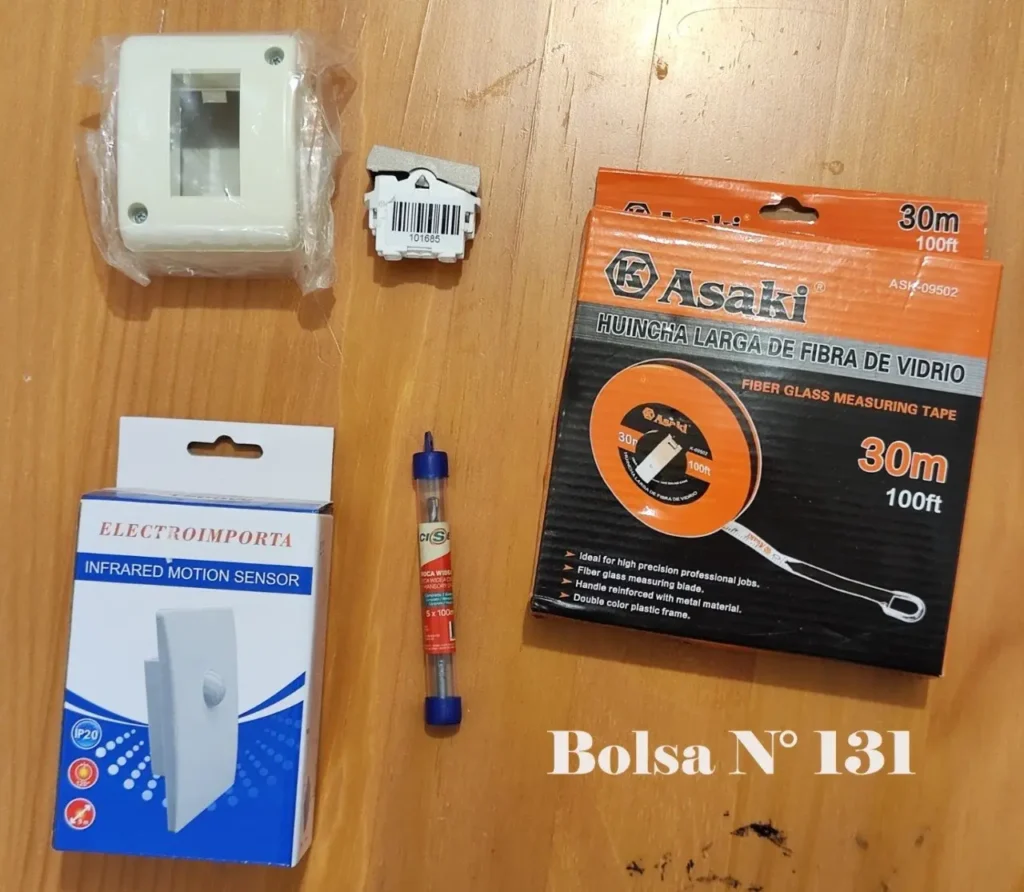 Cinta métrica Asaki de 30m, sensor de movimiento infrarrojo, caja eléctrica e interruptor. by Remates Narvaja