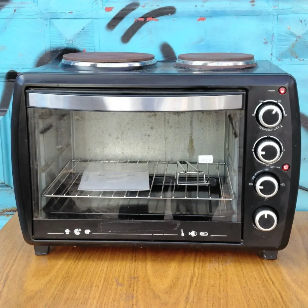 Horno de sobremesa eléctrico negro con dos placas de cocción. by Remates Narvaja
