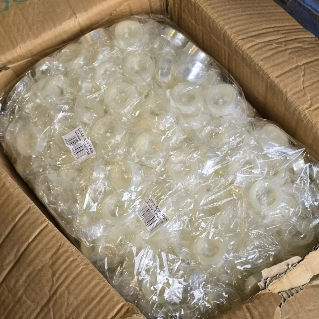 Caja con rollos de cinta transparente para globos, empaquetados individualmente. by Remates Narvaja