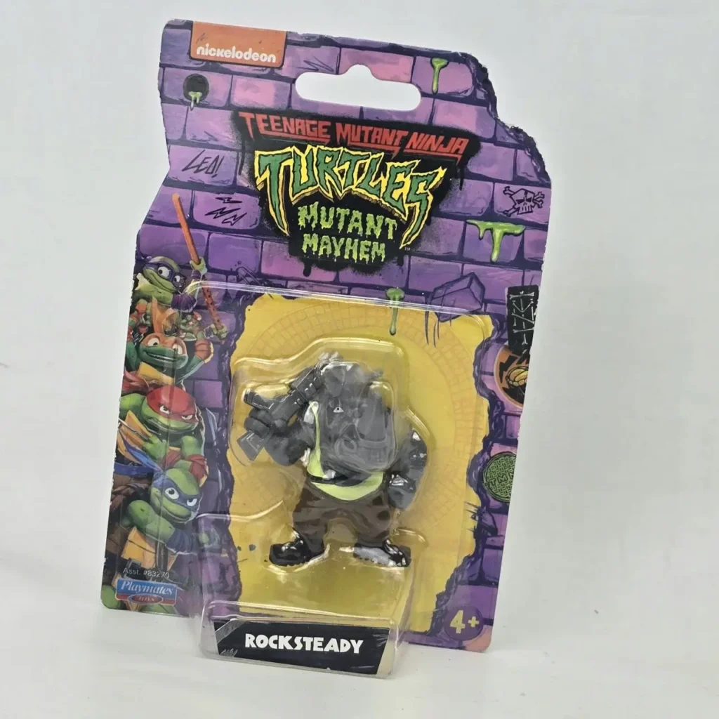 Figura de acción de Rocksteady de Teenage Mutant Ninja Turtles Mutant Mayhem, nueva en su empaque original. by Remates Narvaja