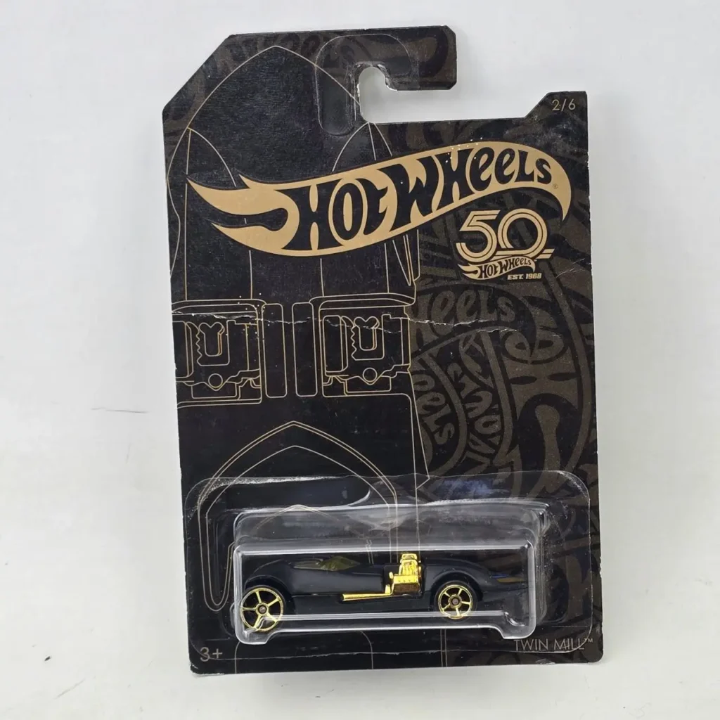 Hot Wheels Twin Mill 50 Aniversario negro y dorado en paquete. by Remates Narvaja